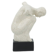 Male Figurine on Black Base