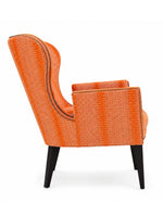 An orange wingback armchair with a textured woven pattern and black legs, shown from a side profile view on a white background.