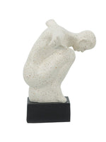 Male Figurine on Black Base